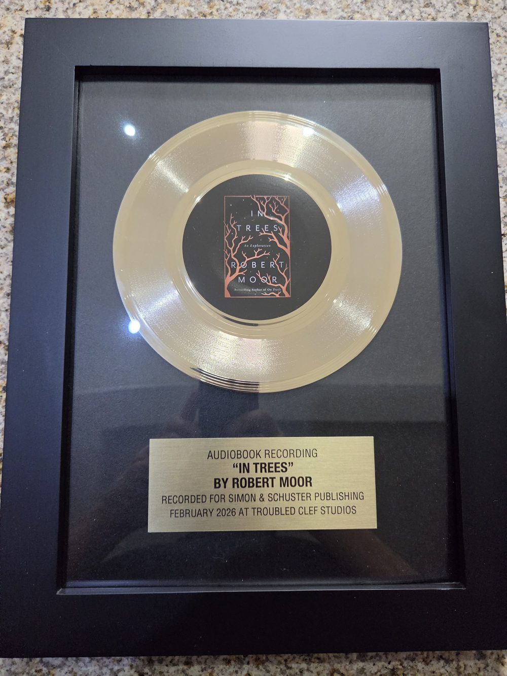 Framed Simon & Schuster award plaque for the audiobook recording of In Trees by Robert Moor, recorded February 2026 at Troubled Clef Studios